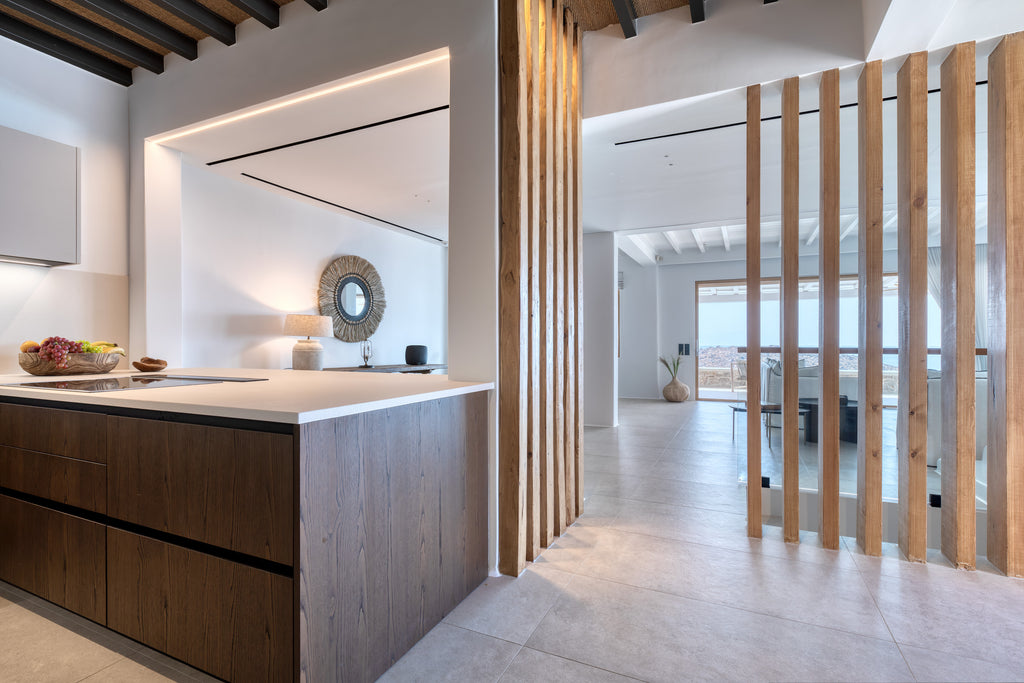 Modern kitchen with wooden island and sliding glass door