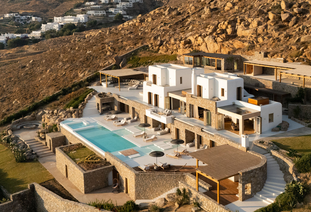 Luxury villa with a pool and outdoor area on a hillside