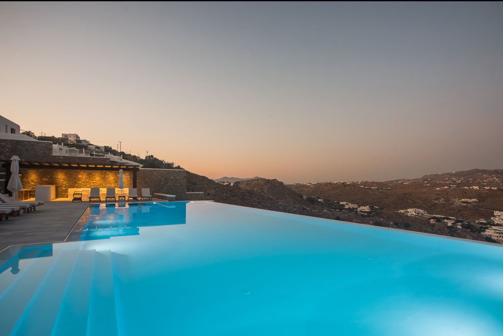 Infinity pool with scenic view at dusk