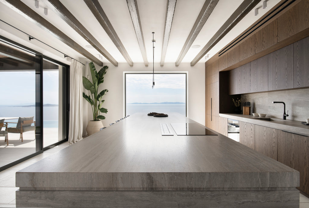 Modern kitchen with large island and ocean view
