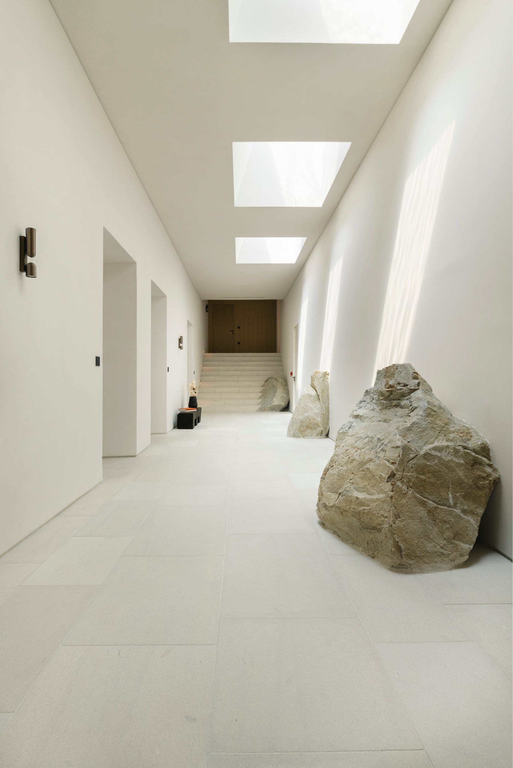 Modern interior with large rocks and minimalist design